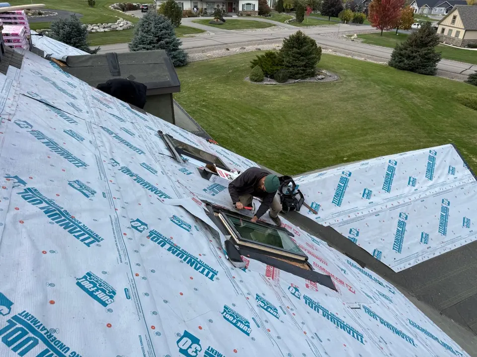 Roof deck with underlayment being installed before shingles on a new build