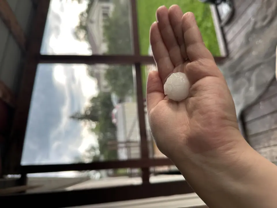 Hailstones collected on a roof surface after a Flathead Valley summer storm