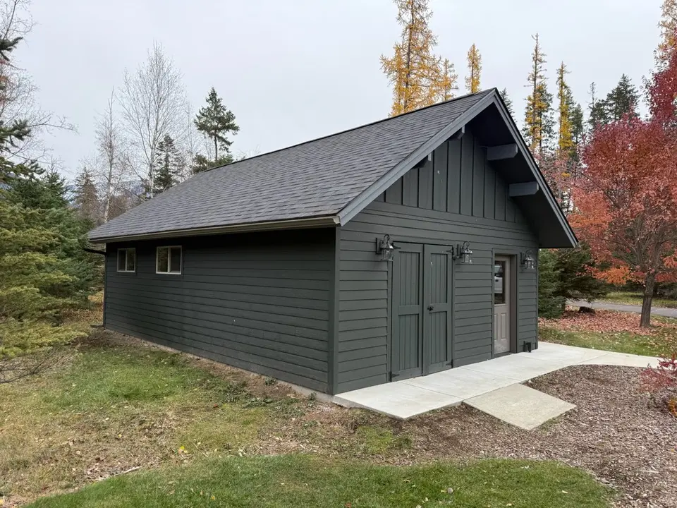 Craftsman-style home in the Flathead Valley with wood lap siding and an architectural shingle roof